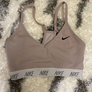light pink Nike sports bra
